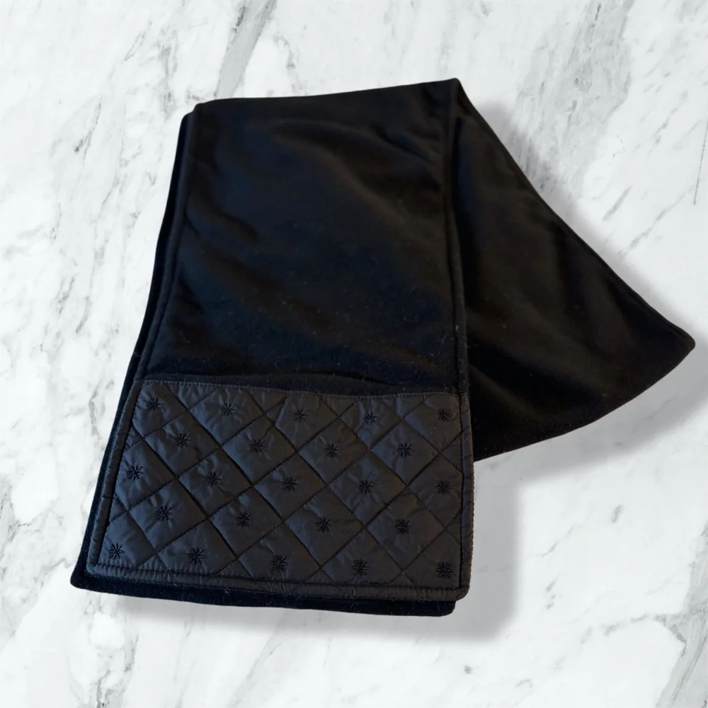 Eddie Bauer finely woven‎ fleece scarf in black with a quilted accent. 64” x 9”